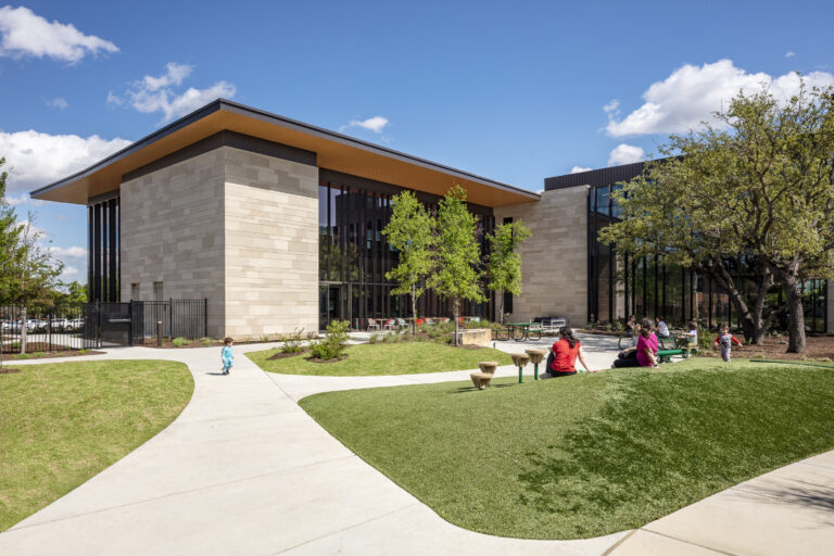 Dell Jewish Community Center Expansion designed by Beck Architecture
Beck provided master planning, architecture, and interior design for the Dell Jewish Community Center. The project spanned multiple phases and included the renovation and expansion of multiple existing buildings, along with the construction of new community, fitness, aquatics and tennis facilities.  Beck’s design focused on creating vibrant spaces that prioritized places for gathering, sustainability and resilience, while infusing meaning into the architecture itself, inspired by the rich cultural heritage of the Jewish people.
The final phase provided a 40,000 SF community and fitness building, which now serves as the main entry for the community center.  The design takes inspiration both from local design strategies and materiality, while infusing meaning from Jewish culture. The building includes a new coffee shop, multi-purpose meeting rooms, an upgraded fitness center, and Shalom Austin’s offices. This phase also included an aquatics expansion and a new tennis facility with a lap pool, play pool, water slides, and concessions building, as well as six outdoor tennis courts.

Beck’s work on the Dell Jewish Community Center is a testament to their expertise and dedication to excellence in architectural design and planning. The project’s impact will be felt for years to come, as the community benefits from the new and improved amenities.